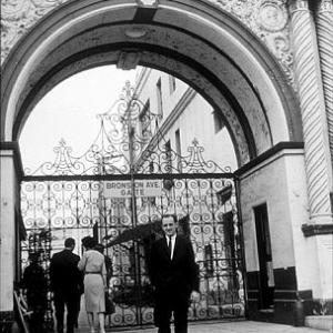 Bob Newhart in front of the Bronson Gate at Paramount Studios, 1961.