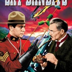 Joe De Stefani and James Newill in Sky Bandits (1940)