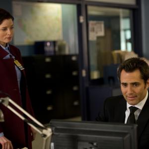 Victor Webster and Rachel Nichols in Continuum (2012)