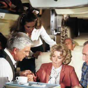 Still of Leslie Nielsen and Julie Hagerty in Airplane! (1980)