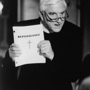 Still of Leslie Nielsen in Repossessed (1990)