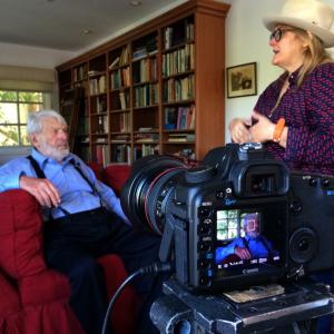 director/producer Michele Noble films actor/folksinger Theo Bikel at his home for his acceptance speech for RIIFF Lifetime Achievement Award