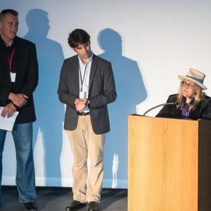 On stage opening night Rhode Island International Film Festival remarks by directorproducer Michele Noble about her film Journey 4 Artists and her mentor Theodore Bikel recipient of 2014 RIIFF Lifetime Achievement Award