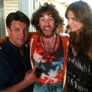 JR Nutt on the set of Castle with Nathan Fillion and Stana Katic