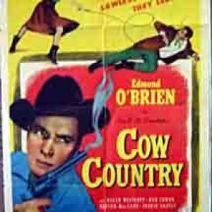 Peggie Castle and Edmond OBrien in Cow Country 1953