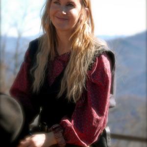 Behind the Scenes  Renee OConnor relaxes between takes on the set of Ghost Town The Movie filmed in Maggie Valley North Carolina November 2006 at Ghost Town in the Sky