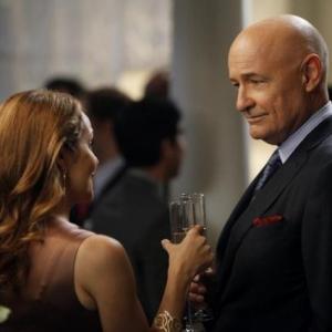 Still of Mili Avital and Terry OQuinn in 666 Park Avenue 2012