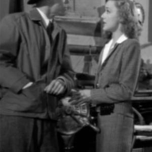 Michael O'Shea and Anne Shirley in Man from Frisco (1944)