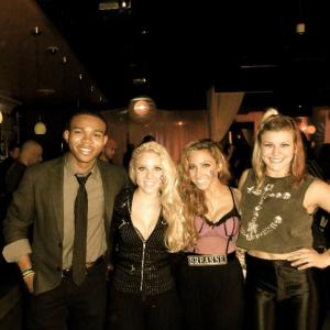 Breanne Oaks with sister Brittany Oaks, Janelle Ginestra, and Robert Bailey Jr. at the Art4LIfe show