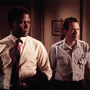 Still of Sidney Poitier and Warren Oates in In the Heat of the Night 1967
