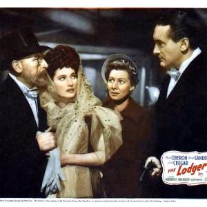 George Sanders, Doris Lloyd and Merle Oberon in The Lodger (1944)