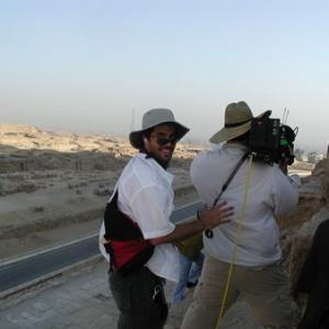 Producer Rick Ojeda DP Evan Nesbitt and Director David Raynr carefully clutch to the side of the Great Pyramid of Egypt