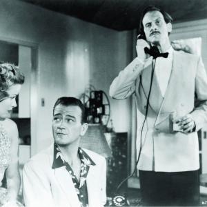 Still of John Wayne and Nancy Olson in Big Jim McLain (1952)