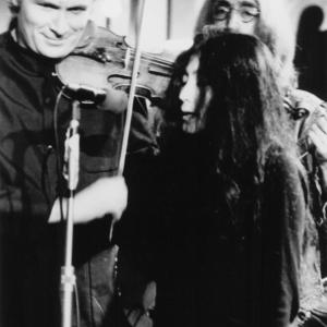 Still of John Lennon and Yoko Ono in The Rolling Stones Rock and Roll Circus 1996
