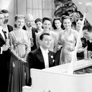 Still of Robert Young Rose Hobart Reginald Owen and Cyril Ring in Lady Be Good 1941