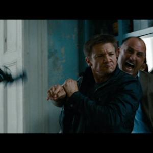 Michael Papajohn and Jeremy Renner in The Bourne Legacy