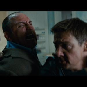 Michael Papajohn, Jeremy Renner, and Elizabeth Marvel in The Bourne Legacy