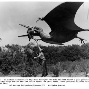 Still of Doug McClure and Bobby Parr in The Land That Time Forgot (1975)