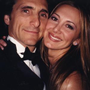 Producer Lawrence Bender with actress Natasha Pavlovich at an Oscars after party
