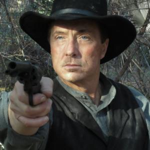 Lee Perkins as Jim Simmons The Gunslinger in INJUN