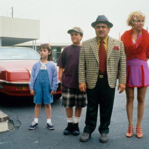 Still of Danny DeVito, Rhea Perlman and Mara Wilson in Matilda (1996)