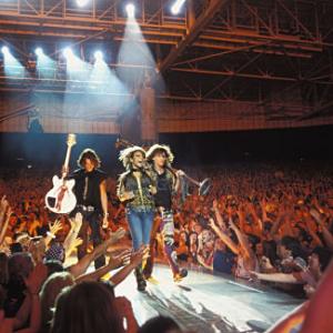 Linda (CHRISTINA MILIAN) performs with Aerosmith rockers STEVEN TYLER (right) and JOE PERRY in MGM Pictures' comedy BE COOL.