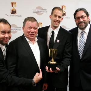 Animated feature winners Jonas Rivera Pete Docter and Bob Peterson with presenter and event host William Shatner