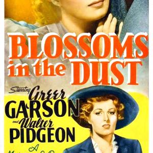 Greer Garson and Walter Pidgeon in Blossoms in the Dust (1941)