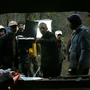 Mohammad Davudi left Rafi Pitts center Mehdi Pourmoussa right on the set of The Hunter 2010
