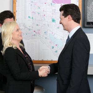 Still of Sean Hayes and Amy Poehler in Parks and Recreation 2009