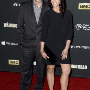 Melissa Ponzio and Kenny Alfonso arrive at the premiere of AMC's 'The Walking Dead' 4th season at Universal CityWalk on October 3, 2013 in Universal City, California
