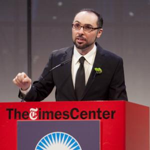Yoav Potash accepting the Hillman Prize for Broadcast Journalism at Times Center in New York City.