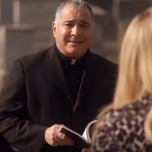 Mitch Poulos as the Priest in ARRESTED DEVELOPMENT 