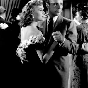 Still of Rhonda Fleming and Dick Powell in Cry Danger (1951)