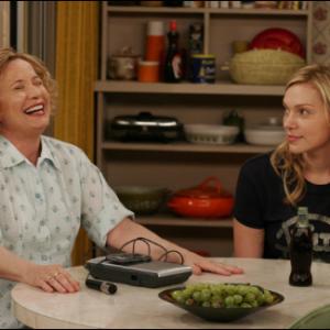 THAT '70s SHOW: Kitty (Debra Jo Rupp, L) and Donna (Laura Prepon, R) make a tape in the one-hour season premier episode of THAT '70s SHOW 