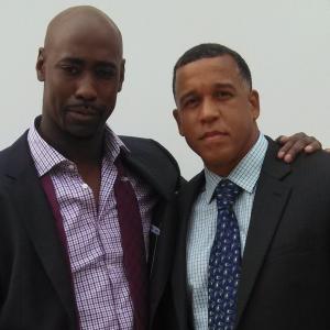 Griffin (Leon Pridgen) with Malcolm (D. B. Woodside) on the set of 