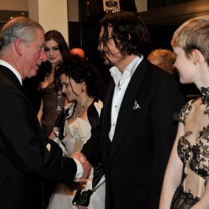 Prince Charles greets Johnny Deep at the Royal World Premiere of Alice in Wonderland