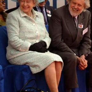 David Puttnam with Her Majesty the Queen at 'Change For Good' charity event