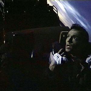 Max (John Pyper-Ferguson) holds on tight to a runaway coaster in David Winning's KILLER IMAGE (1992)