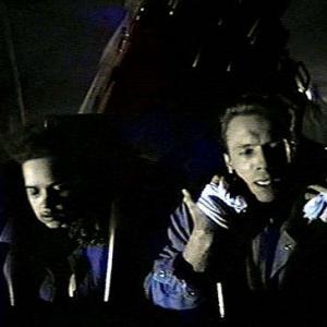 Max John PyperFerguson with Lori Chantelle Jenkins holds on tight to a runaway coaster in David Winnings KILLER IMAGE 1992