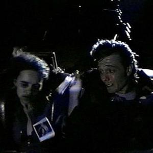 Max John PyperFerguson with Lori Chantelle Jenkins grabs for the photo in a runaway coaster in David Winnings KILLER IMAGE 1992