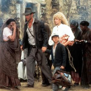 Still of Harrison Ford, Kate Capshaw and Jonathan Ke Quan in Indiana Dzounsas ir lemties sventykla (1984)
