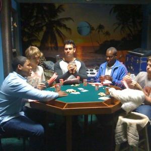 The famous bachelor party poker game with the boys and Dudley during rehearsal.