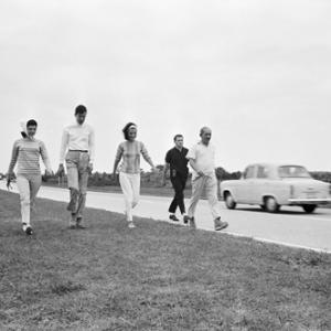 Secret Service agent Clint Hill with Jacqueline Kennedy, Charles (Chuck) Spalding, Lee Radziwill and Stash Radziwill during the fifty-mile hike along the Sunshine Parkway, from Palm Beach towards Miami, in February of 1963
