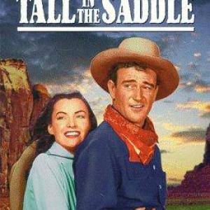 John Wayne and Ella Raines in Tall in the Saddle (1944)