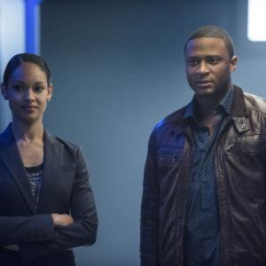 Still of David Ramsey, Cynthia Addai-Robinson and Amanda Waller in Strele (2012)