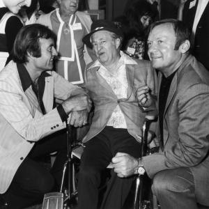 Larry Fine, George Montgomery and Aldo Ray