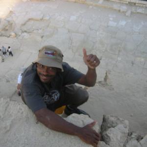 David Raynr climbs the great Pyramid in Cairo Egypt 2004