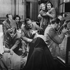 Still of Margaret Lockwood Cecil Parker Basil Radford Michael Redgrave Linden Travers Naunton Wayne and Dame May Whitty in The Lady Vanishes 1938