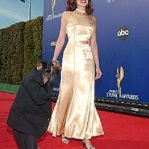 Jonas, the Professional Stunt Monkey and star of Planet of the Apes, escorts Laurie Reeves down the red carpet at the 2004 World Stunt Awards